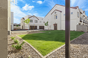 Phoenix townhouse for rent - the front yard of a house with grass and a lawn