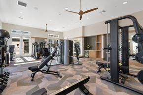 Whittier townhouse for rent - a gym with weights and cardio equipment in a luxury home