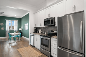 Tampa apartment for rent - a kitchen with stainless steel appliances and a stainless steel refrigerator