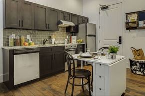 Tampa apartment for rent - a kitchen with a island and a stove and a refrigerator