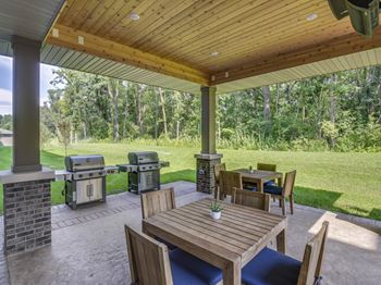 Outdoor grill with intimate seating area