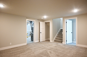 Gretna apartment for rent - A spacious room with carpeted floor and white walls.