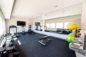 Alliance apartment for rent - A well-equipped gym with a variety of exercise equipment.