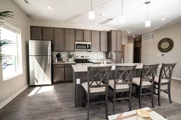Lincoln apartment for rent - A modern kitchen with a dining table and chairs.