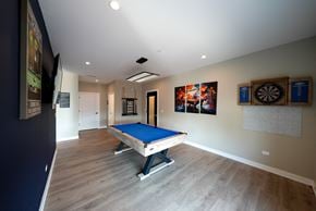 Highwood apartment for rent - a rec room with a pool table in a house