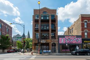 Chicago apartment for rent - a brick building on the corner of a city street at West Chicago 1701, Chicago