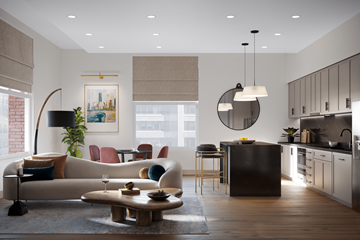 Chicago apartment for rent - A modern living room with a large couch and a coffee table in the center.