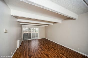 Hardwood-style flooring in kitchens and living areas