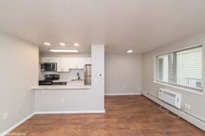 Denver apartment for rent - Open living area with beautiful wood flooring at 1354 High in Denver, CO
