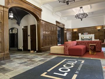 Chicago apartment for rent - a living room with a couch and a rug on the floor