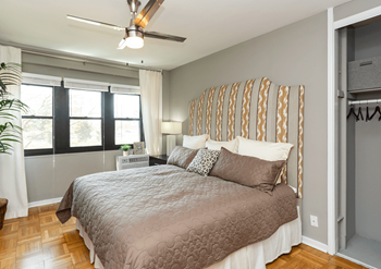 Bedroom with a ceiling fan at bridgeyard in alexandria, va
