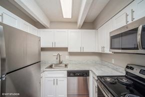 Denver apartment for rent - Upscale kitchen with stainless steel appliances at 878 S Dexter St in Denver, CO