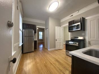 Large updated kitchen with stainless steel appliances