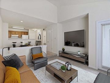 Laurel apartment for rent - a living room with a couch and a tv