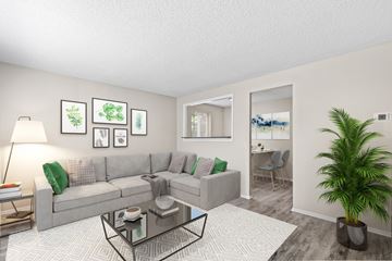 Denver apartment for rent - a living room with a couch and a coffee table
