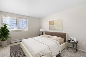 Denver apartment for rent - A peaceful retreat with plush carpeting, neutral tones, and city views at 1190 S Bellaire St in Denver, CO