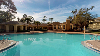 Large swimming pool with sun deck