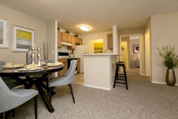 Open kitchen with breakfast bar and pantry