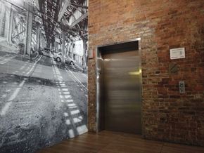 Chicago apartment for rent - Fun mural on wall by the elevator at Carriage House Lofts, Chicago, 60605