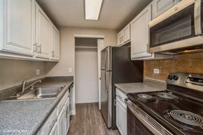 Glendale apartment for rent - Stainless steel appliances with a built in microwave at The Helix in Denver, CO