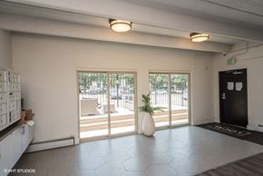 Denver apartment for rent - Large windows in the spacious clubhouse at 1140–1160 S Bellaire St in Denver, CO