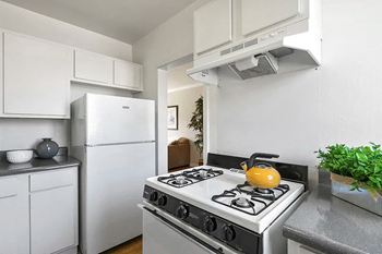 Refrigerator and stove included
