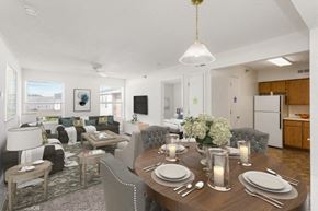 Newport News apartment for rent - A dining room with a table set for dinner.