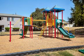 Los Angeles apartment for rent - a playground with a swing set and slides
