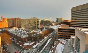 Silver Spring apartment for rent - A city street with buildings and cars on a winter day.