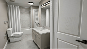 Updated bathrooms coming soon in select renovated residences, with contemporary vanities, light countertops, large-format tub-surround tile, refreshed flooring and modern lighting