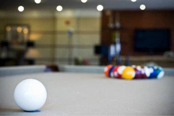 Enjoy the clubroom with pool table, large tv and an entertaining kitchen