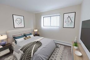 Euclid apartment for rent - a bedroom with a bed and a tv