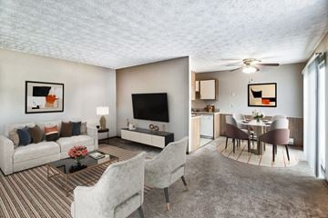 Columbus apartment for rent - a living room and dining room with a couch and a table