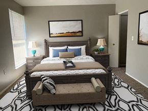 Medina apartment for rent - a bedroom with a large bed and a zebra rug