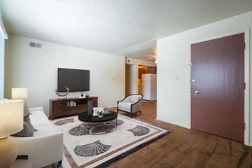 Bedford Heights apartment for rent - a living room with a couch and a television
