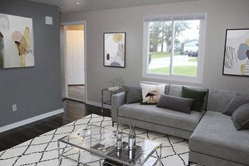 Lorain apartment for rent - a living room with a couch and a coffee table