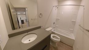 Dartmouth apartment for rent - A bathroom with a sink, toilet and bathtub.