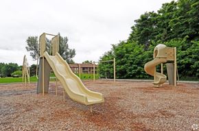 Farmington Hills apartment for rent - two slides on a playground in a park
