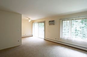 Westland apartment for rent - an empty living room with a large window