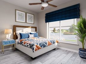 Whitestown apartment for rent - A bedroom with a bed, a ceiling fan, and a window with blinds.