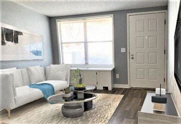 Marietta apartment for rent - A living room with a white couch and a grey coffee table.