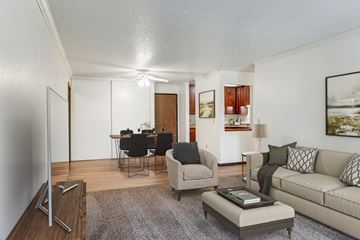 New Hope apartment for rent - a living room with a couch and a chair and a dining room