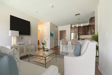 Brooklyn Center apartment for rent - a living room with a couch and a table