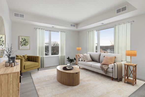 Eagan apartment for rent - the living room of an apartment with a couch and a table