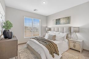 Maricopa apartment for rent - A bedroom with a large bed and a wooden dresser at Copa Flats Apartments, Maricopa, 85138