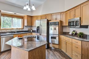 St. Paul apartment for rent - an updated kitchen with stainless steel appliances and granite counter tops at Crosby Pointe Apartments, Minnesota, 55116-3244
