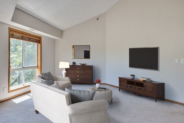 St. Paul apartment for rent - Living Room With TV at Crosby Pointe Apartments, St. Paul, MN