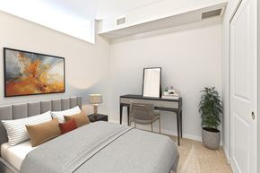 Rochester apartment for rent - a bedroom with a bed and a desk at EastGate Apartments, Rochester, Minnesota