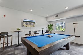 Rochester apartment for rent - a games room with a pool table and a tv at EastGate Apartments, Rochester, MN, 55904