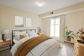 St Paul apartment for rent - a bedroom with a bed and a window at Ames Lake Neighborhood Apartments, St. Paul, Minnesota